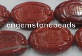 CRE19 16 inches 22*30mm carved oval natural red jasper beads wholesale