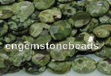 CRH89 15.5 inches 10*14mm faceted oval rhyolite beads wholesale