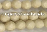 CRJ626 15.5 inches 4mmm faceted round white fossil jasper beads