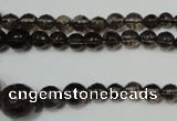 CRO743 15.5 inches 6mm – 14mm faceted round smoky quartz beads