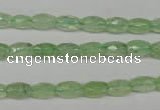 CRU165 15.5 inches 5*8mm faceted rice green rutilated quartz beads