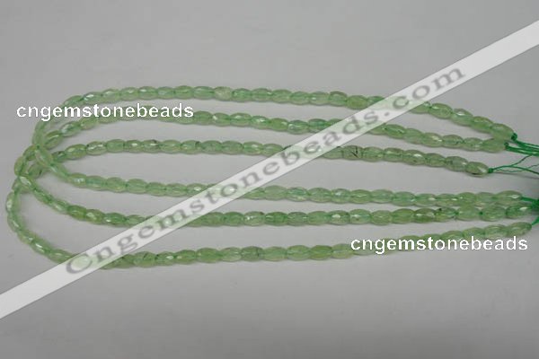 CRU165 15.5 inches 5*8mm faceted rice green rutilated quartz beads