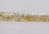 CRU666 15.5 inches 4mm faceted round golden rutilated quartz beads