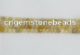 CRU667 15.5 inches 6mm faceted round golden rutilated quartz beads