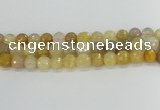 CRU669 15.5 inches 10mm faceted round golden rutilated quartz beads