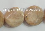 CSS256 15.5 inches 20mm twisted coin natural sunstone beads