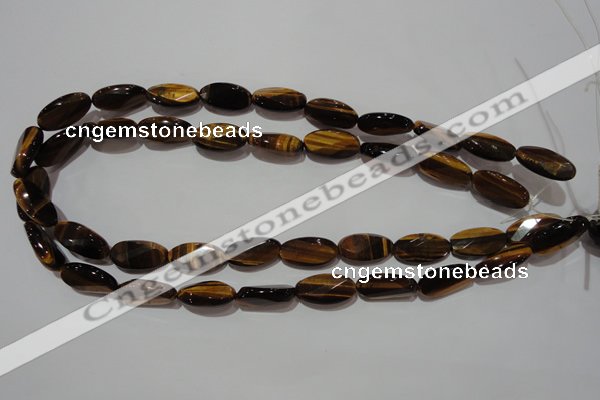 CTE1098 15.5 inches 10*20mm twisted & faceted oval yellow tiger eye beads