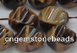 CTE1592 15.5 inches 13*18mm twisted rice yellow tiger eye beads