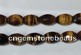 CTE206 15.5 inches 6*8mm faceted rice yellow tiger eye beads