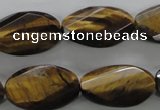 CTE322 15.5 inches 15*25mm twisted & faceted oval yellow tiger eye beads