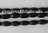 CTO116 15.5 inches 5*10mm faceted rice black tourmaline beads