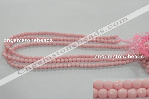 CTU1511 15.5 inches 4mm faceted round synthetic turquoise beads