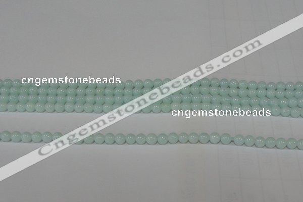 CTU2563 15.5 inches 4mm round synthetic turquoise beads