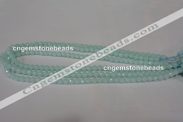 CTU2572 15.5 inches 6mm faceted round synthetic turquoise beads