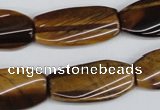 CTW103 15.5 inches 15*30mm twisted rectangle tiger eye beads