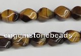 CTW151 15.5 inches 8*11mm twisted rice yellow tiger eye beads