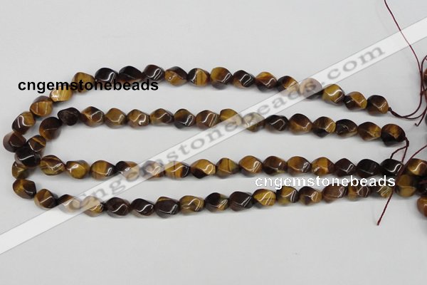 CTW151 15.5 inches 8*11mm twisted rice yellow tiger eye beads