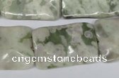 CTW321 15.5 inches 20*30mm wavy rectangle peace stone beads