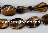 CTW63 15.5 inches 13*18mm twisted oval yellow tiger eye beads