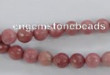 CWF01 15.5 inches 6mm faceted round pink wooden fossil jasper beads