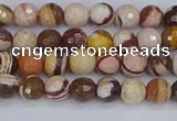 CZJ278 15.5 inches 4mm faceted round zebra jasper beads