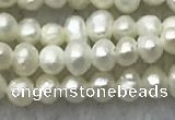 FWP05 14.5 inches 2mm - 2.5mm potato white freshwater pearl strands