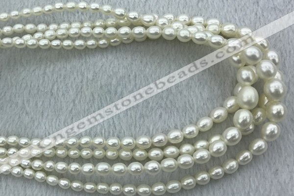 FWP212 15 inches 4mm - 9mm rice white freshwater pearl strands