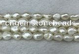 FWP286 15 inches 9mm - 10mm baroque white freshwater pearl strands